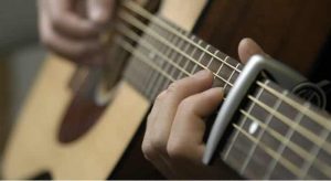 Read more about the article Why Should You Use an Acoustic Guitar Capo Instead of Manually Tuning the Guitar Strings?